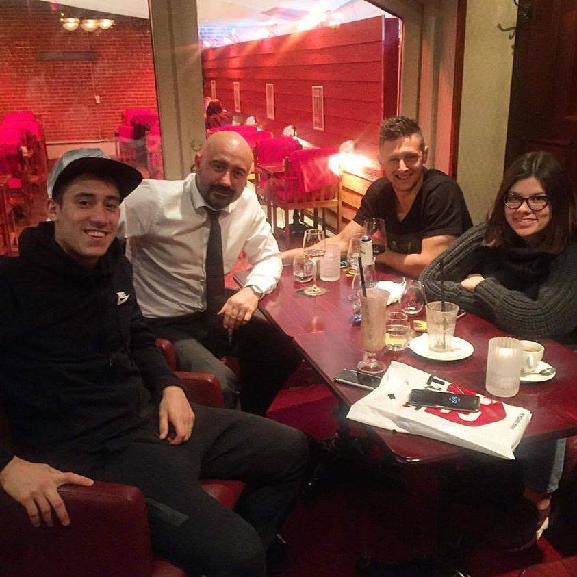 Paschalis Tountouris with players and colleagues during an earlier chapter of the work